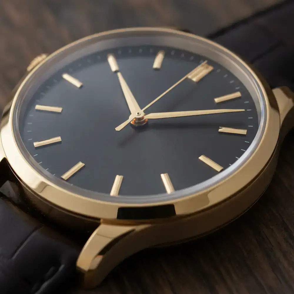 Close up of a premium watch dial with gold hands